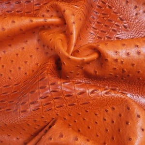 Orange Mutant Ostrich Gator Embossed Vinyl Fabric